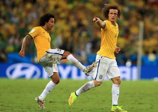 Brazil's David Luiz celebrates scoring his side's second goal.