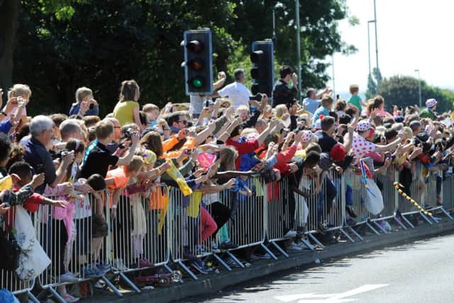 Crowds line the streets of Yorkshire