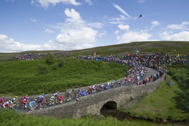 The Peloton passes through the village of Reeth, North Yorkshire