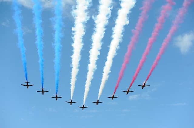 The Red Arrows perform a flypast during the Grand Depart at Harewood House, near Leeds