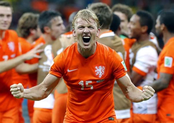 Netherlands' Dirk Kuyt celebrates after the Netherlands defeated Costa Rica 4-3 in a penalty shootout.