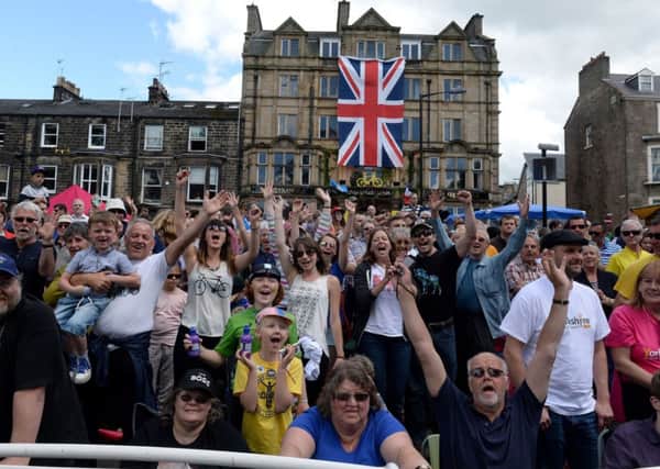 Fans gather near the finishing line of stage one of the Tour de France in Harrogate.
