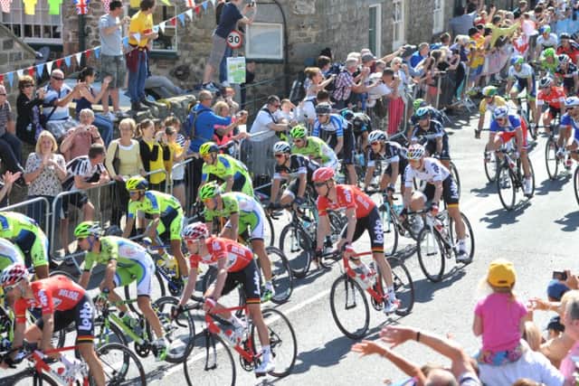 The Tour de France race pictured passing through West Tanfield in North Yorkshire.