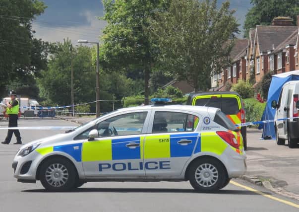 Police on Hermitage Road in Solihull. PIC: PA