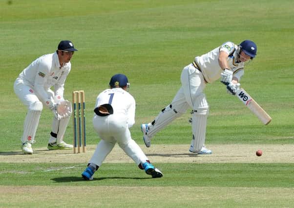 Adam Lyth hits out on his way to his century.