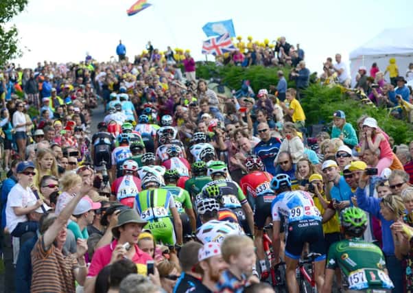 The Tour de France makes its way through the Peak District between Langsett and High Bradfield.