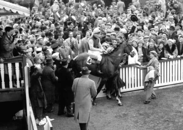 1957 Gold Cup winner Linwell, owned by David Brown and ridden by Michael Scudamore.