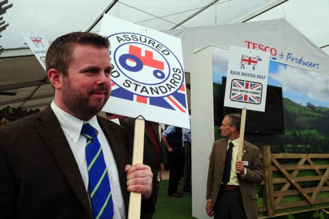 Beef producers protest about prices outside the Tesco marquee at the Great Yorkshire Show.  Picture by Tony Johnson