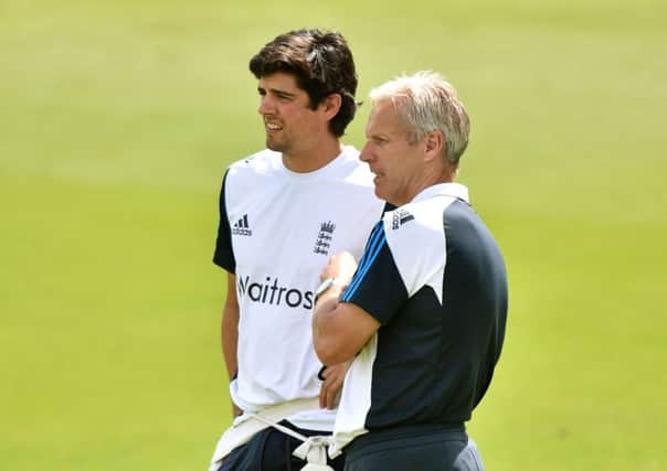 England coach Peter Moores, right, and captain Alastair Cook.