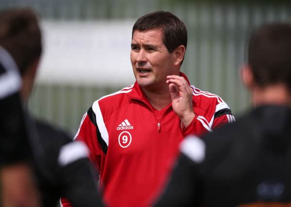 Nigel Clough conducts training today (Picture: Martyn Harrison).