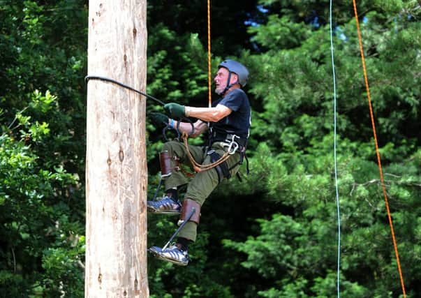 George Tipping, 81, competing in the pole climbing championships at the Great Yorkshire Show.