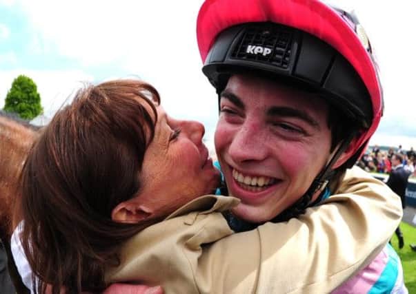 Jockey James Doyle and trainer Lady Cecil embrace after Noble Mission won the Tattersalls Gold Cup (Picture Pat Healy/PA).