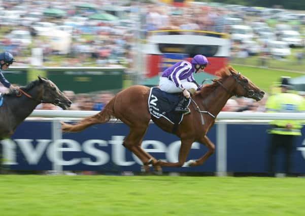 Australia ridden by Joseph O'Brien, right, wins the Investec Derby from Kingston Hill.
