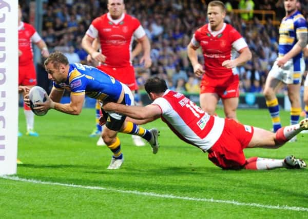 WELCOME BACK: Rob Burrow breaks the deadlock in the 59th minute to score for Leeds.