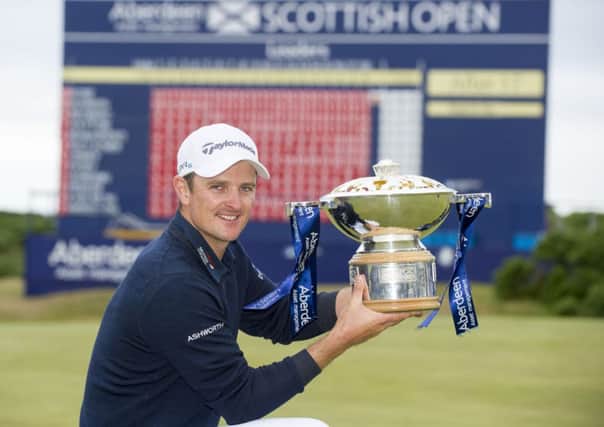 Justin Rose with the Scottish Open Trophy after winning the Aberdeen Asset Management Scottish Open at Royal Aberdeen, Aberdeen.