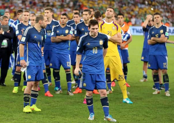 Argentina's Lionel Messi appears dejected after the final whistle of the FIFA World Cup Final.