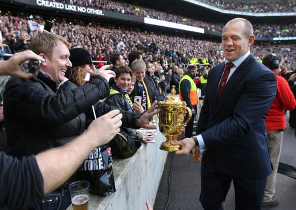 Mike Tindall with the World Cup on a lap of honour to mark the 10 year anniversary of winning the World Cup.
