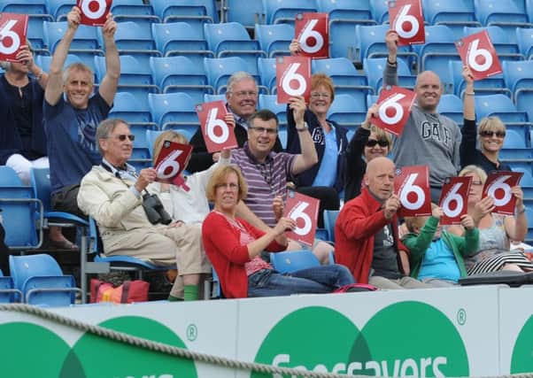 Holmfirth supporters cheer on their school.