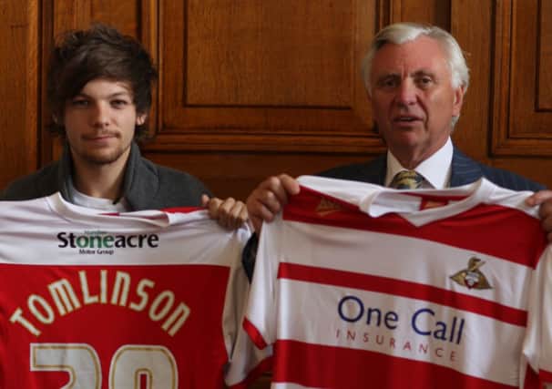 Pop star Louis Tomlinson and former Doncaster chairman John Ryan have seen their takeover plans for Rovers blocked by the Football League.