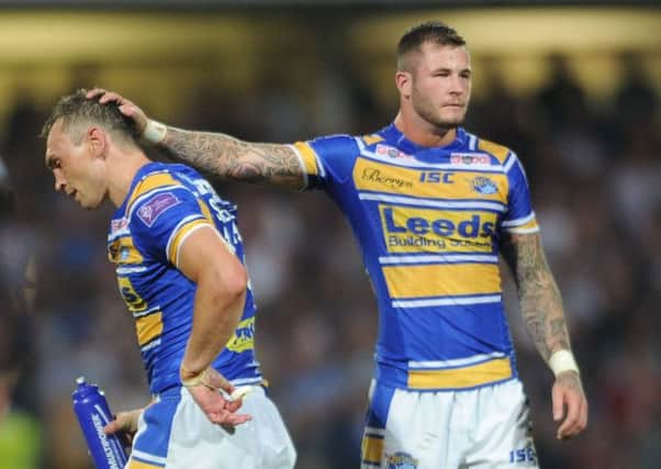 Leeds captain Kevin Sinfield is consoled by Zak Hardaker after being sent off for the first time in his career as the Rhinos were held to a 24-24 draw by Castleford (Picture: Steve Riding).