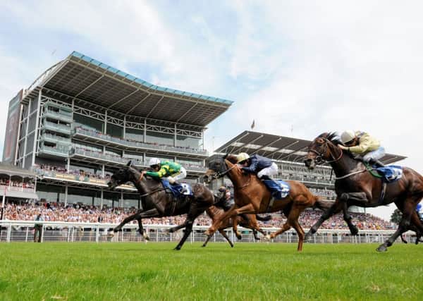 Continuum ridden by Joe Fanning wins the John Smith's Silver Cup Stakes during the 55th John Smith's Cup day of the 2014 John Smith's Cup Meeting at York Racecourse, York. (Picture: Anna Gowthorpe/PA Wire)