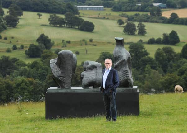 Peter Murray by the Three Piece Reclining Figure 1 by Henry Moore - and other exhibits at the Yorkshire Sculpture Park