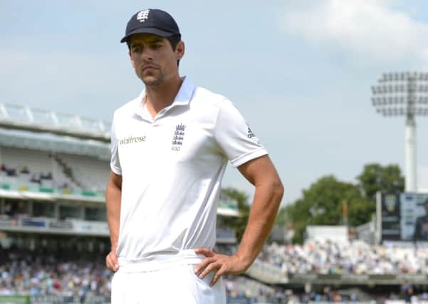 England's Alastair Cook appears dejected after India's victory