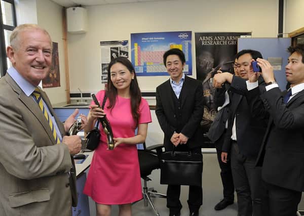 Barry Sheerman MP with Madam Wenmei Du in the Arms and Armoury Research Institute at the 3M Buckley Innovation Centre, Huddersfield University, during a visit by delegates from the China Innovation & Development Association