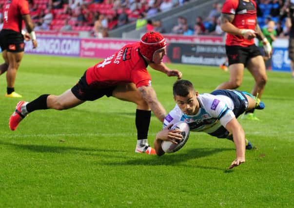 Leeds Rhinos' Stevie Ward goes over for a try against Salford Red Devils. Picture: Steve Riding.