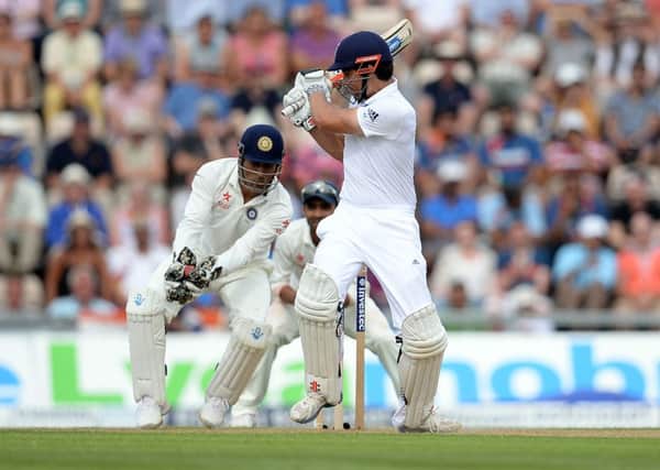 Alastair Cook loses his wicket after edging a shot to India wicket keeper MS Dhoni during day one of the Third Investec Test match at the Ageas Bowl, Southampton.