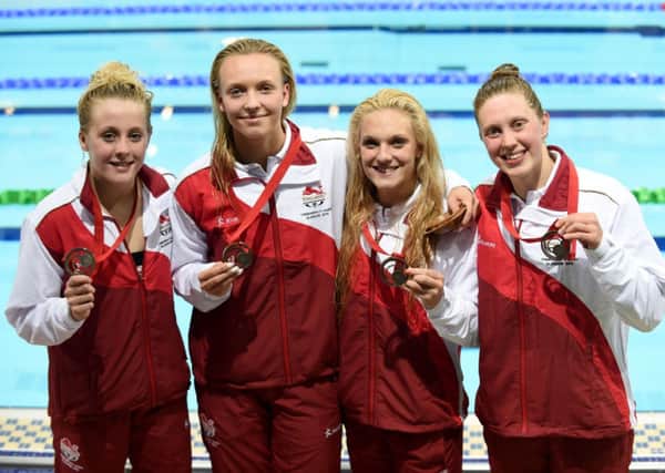(left to right) England's Siobhan O'Connor, Amelia Maughan, Ellie Faulkner and Becki Turner with their bronze medals after the Women's 4x200m freestyle final.