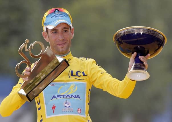 Race winner Vincenzo Nibali of Italy, wearing the overall leader's yellow jersey. (AP Photo/Christophe Ena)