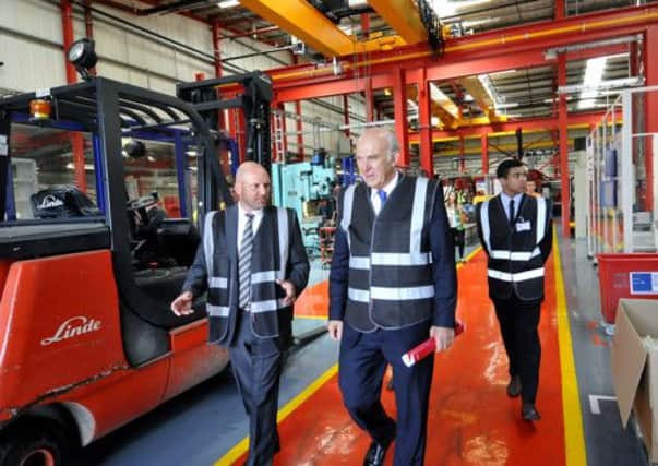 Business Secretary Vince Cable on a visit  to a Yorkshire factory