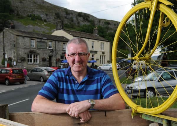 Russel Olliver, landlord at the Tennants Arms in Kilnsey, has seen a big increase in trade before and since the Tour de France in Yorkshire.  Picture by Bruce Rollinson