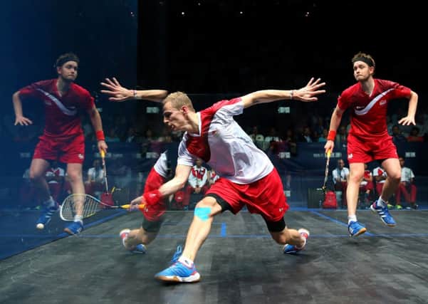 DOUBLING UP: Nick Matthew and James Willstrop are reflected on the all-glass court during yesterdays thrilling final in Glasgow. Picture: Getty Images