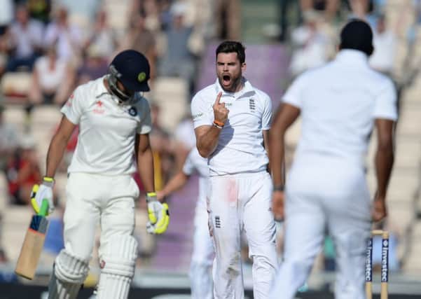 England's James Anderson (centre) celebrates taking the wicket of India's Ravindra Jadeja (left) during day three of the Third Investec Test match at the Ageas Bowl, Southampton.