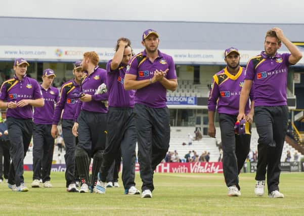 A dejected Yorkshire side leave the field after a narrow defeat to Gloucestershire. (Picture: Allan McKenzie/SWpix.com)