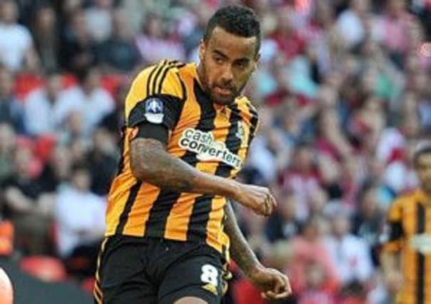 Hull City's Tom Huddlestone missed a second-half penalty in Zilina and then hit the rebound against the crossbar.