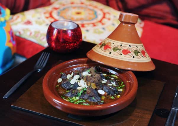 Lamb tagine with dates, almonds and apricots. Picture by Jonathan Gawthorpe