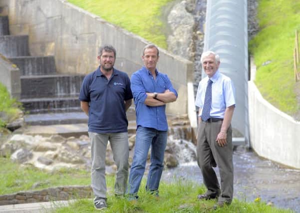 Dave Mann, Managing Director of Mann Power Consulting, with Robson Green and Cragside property curator Andrew Sawyer.