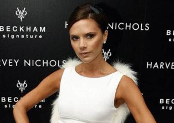 Victoria Beckham is auctioning items of her wardrobe for charity.
Picture: Paul Thomas/AP/PA Photos.
