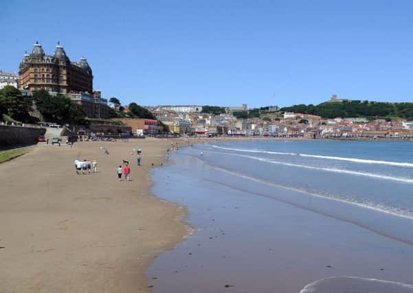 Scarborough's South Bay beach. Below: Holmfirth and Welcome to Yorkshire Chief Executive Gary Verity