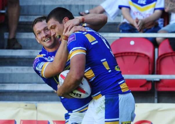 Danny McGuire congratulates Ryan Hall after his second try