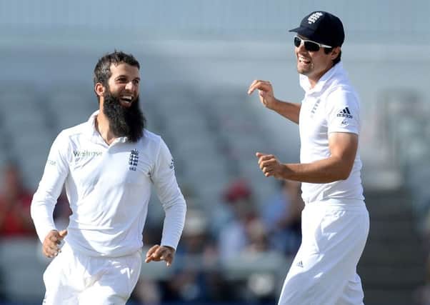 England's Moeen Ali celebrates taking the wicket of India's Ravindra Jadeja