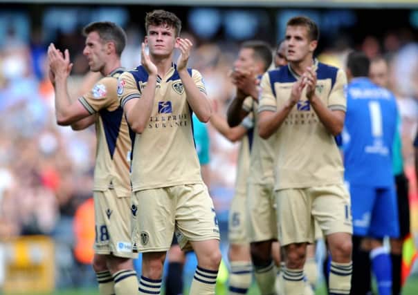 Sam Byram claps the away fans at full time.