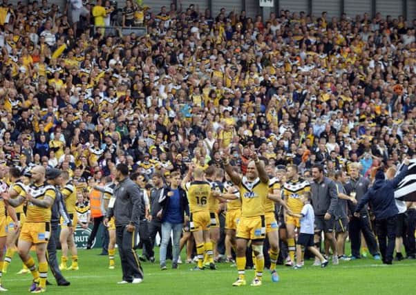Castleford players applaud the fans after semi-final victory over Widnes (Picture: RL Photos).