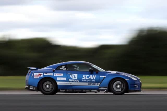 Mike Newman during his world speed record run in Yorkshire behind the wheel of a modified Nissan GT-R. PIC: Ross Parry