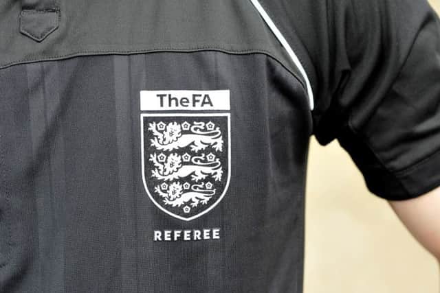 Referee John Chalk and Scalby player Carl Marton avoided bans at this week's FA inquiry into their scuffle last season