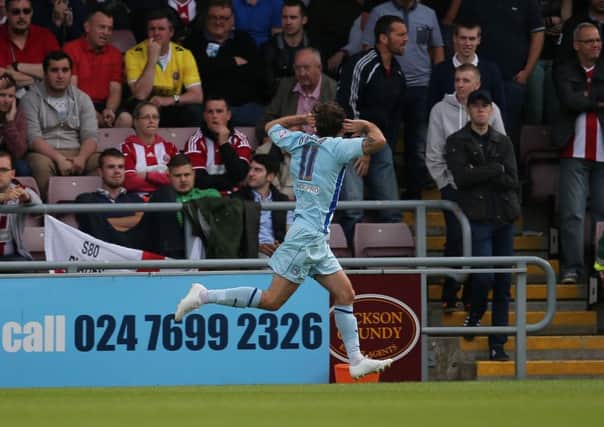 Coventry's James O'Brien celebrates his goal in front of Sheffield United's travelling fans.