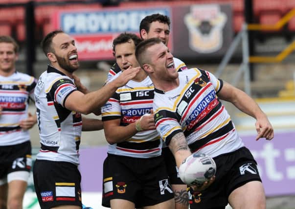 Another win for the Bulls as Adam Sidlow is congratulated after his try